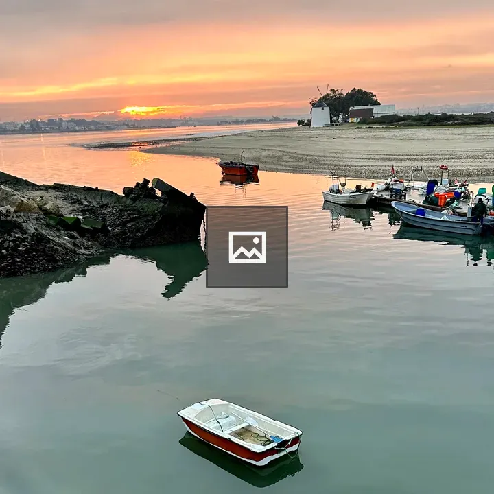 Sunset Boat in Barreiro Bay