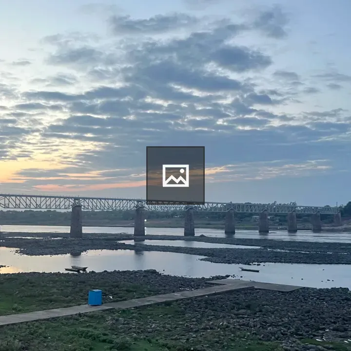 Cloudy evening by the river