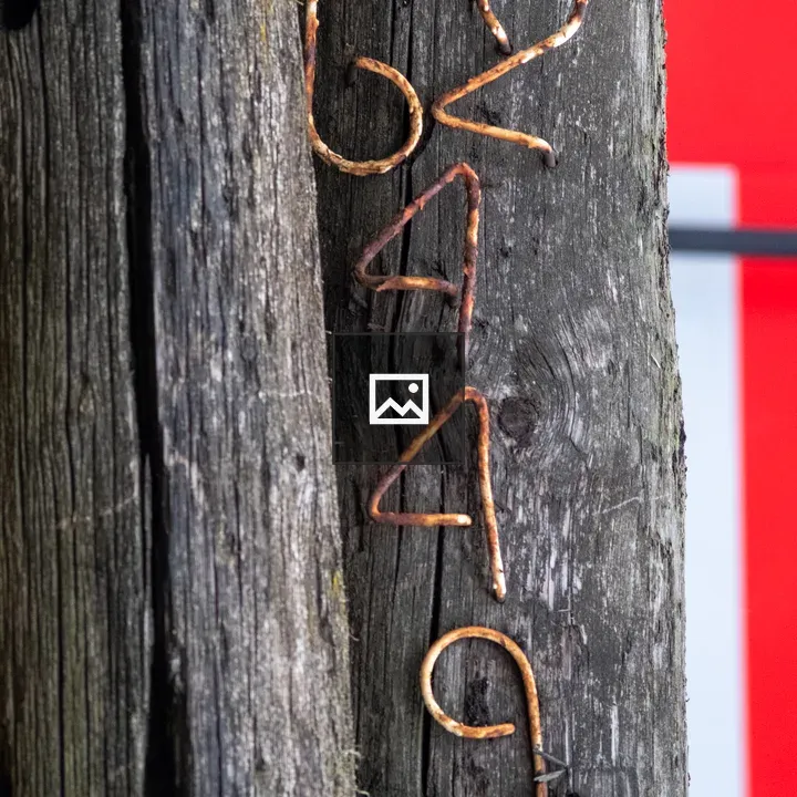 Weathered Wood with Metal Numbers