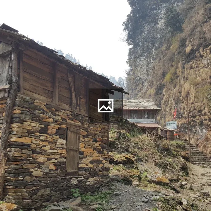 Rugged hut beside stone stairway