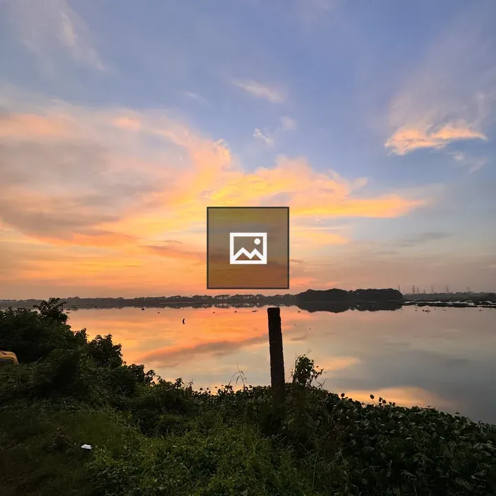 Sunset over calm river