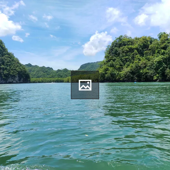 Body of water surrounded by mountains