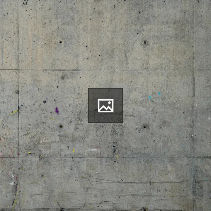 Textured Concrete Wall with Paint Marks
