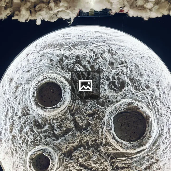 Moon surface with cotton-like clouds