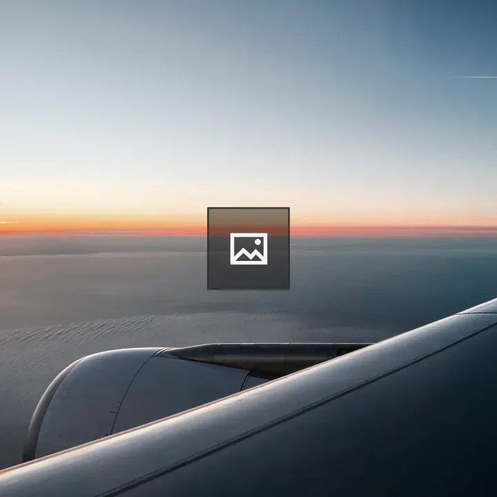 Sunset Behind Airplane Wing