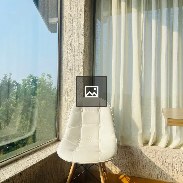 White Chair by Window
