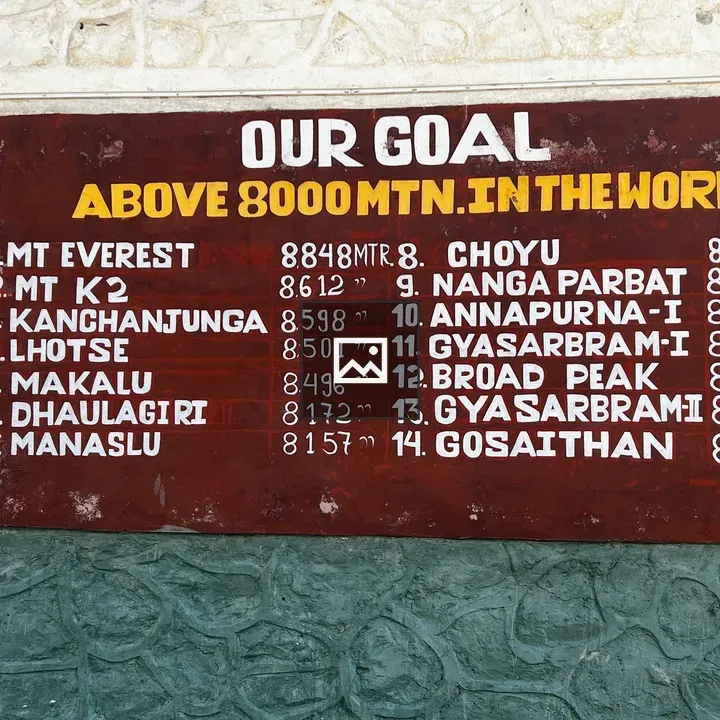 Our goal above 8000m sign