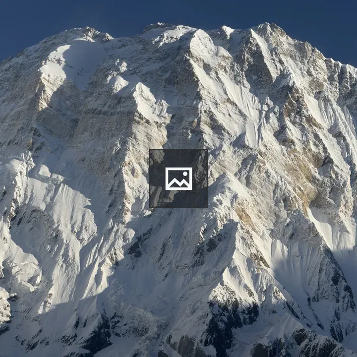 Sunlit Snow Peak