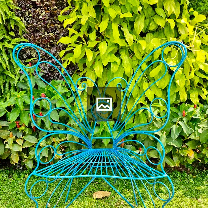 Blue butterfly-shaped metal chair