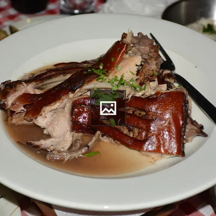 Roasted lechon in broth