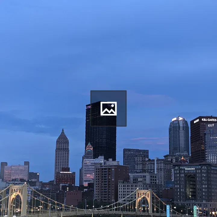 City skyline with yellow bridge
