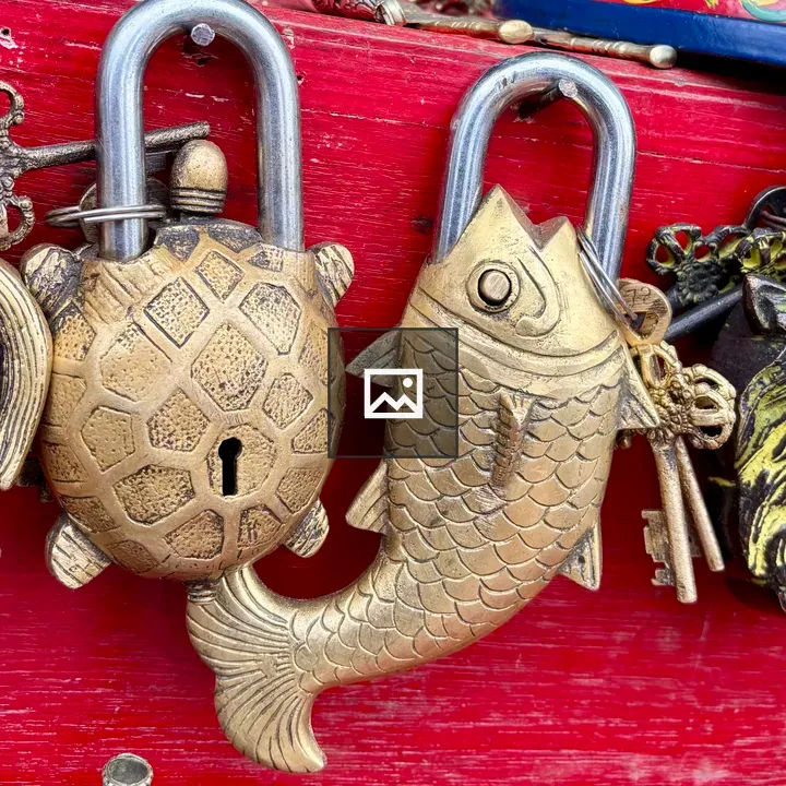 Two Brass Padlocks Shaped Like Animals