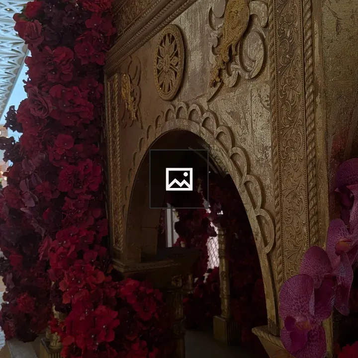 Ornate golden structure with flowers