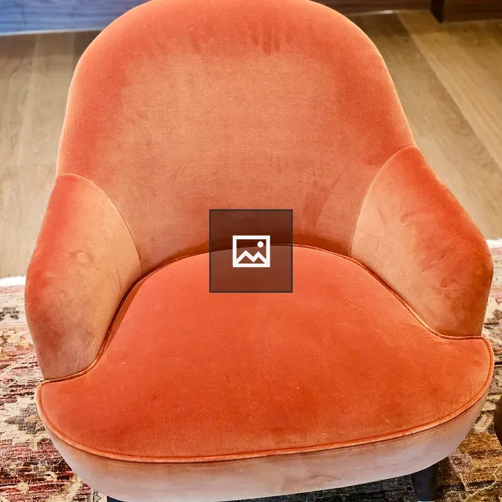 Soft orange velvet chair
