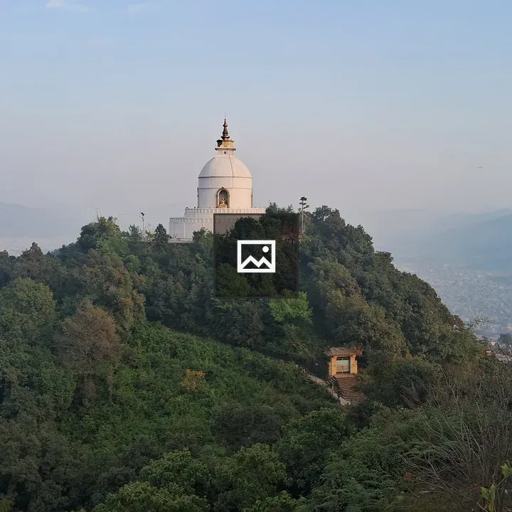 Stupa on green hill
