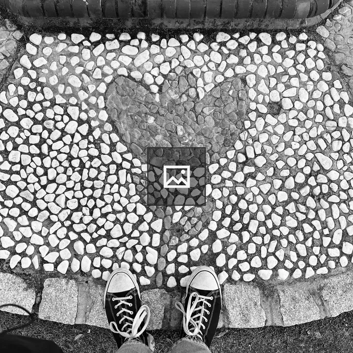 Sneakers on Stone Mosaic