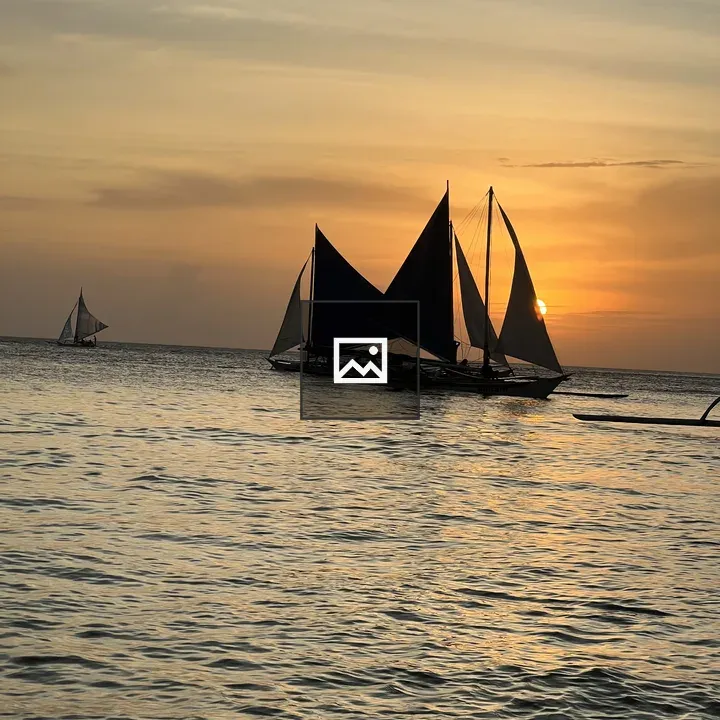 Sunset Sailboats Over Boracay Ocean