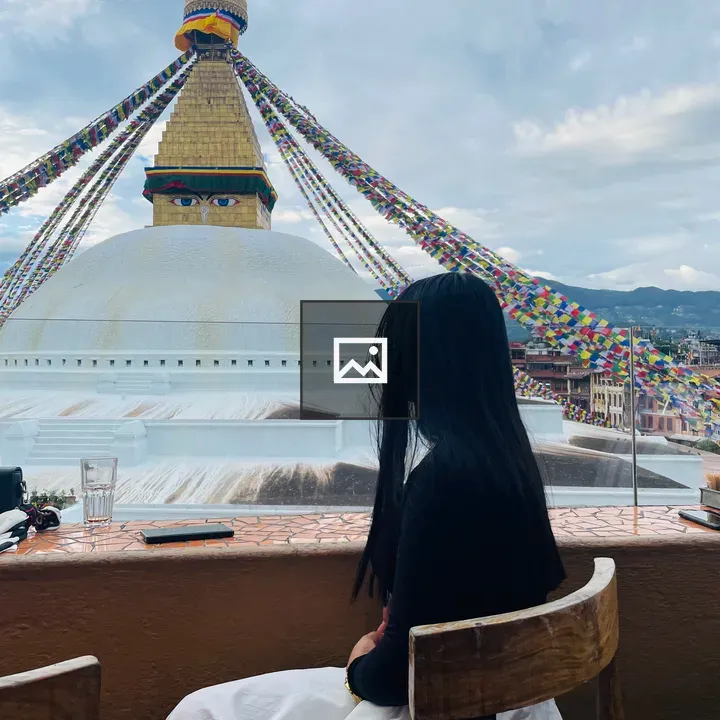 Person beside Boudhanath Stupa