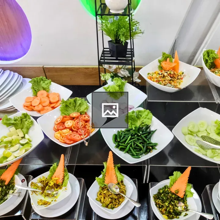Array of fresh vegetables in bowls