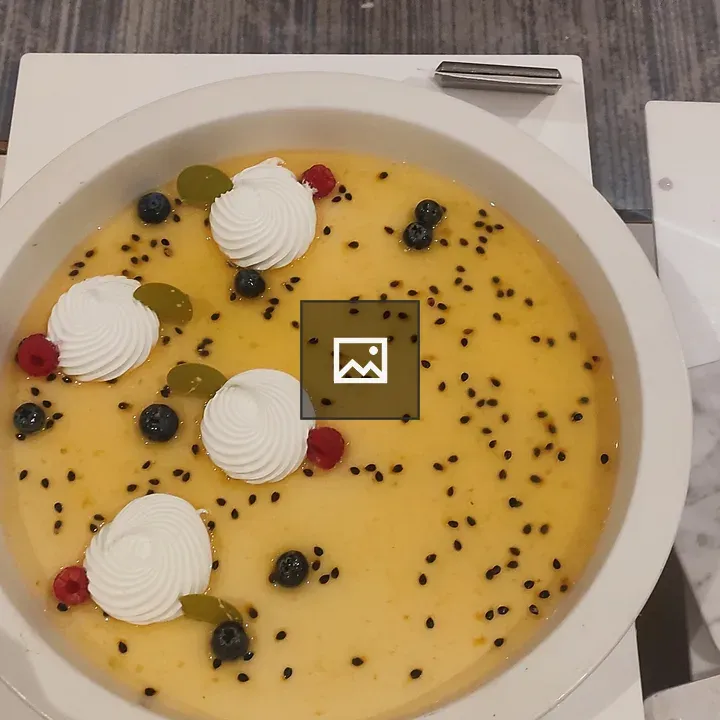 Creamy yellow desserts and chocolate cake