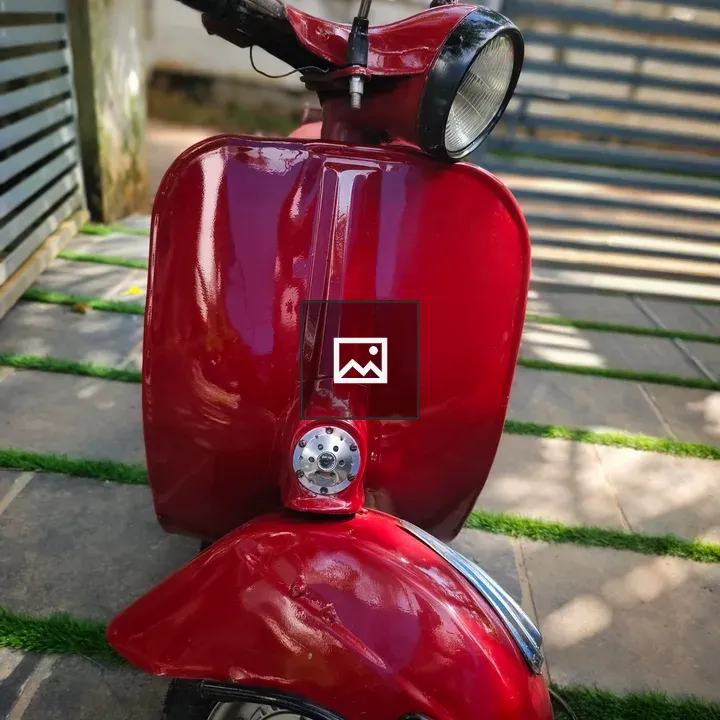 Vintage red scooter front view