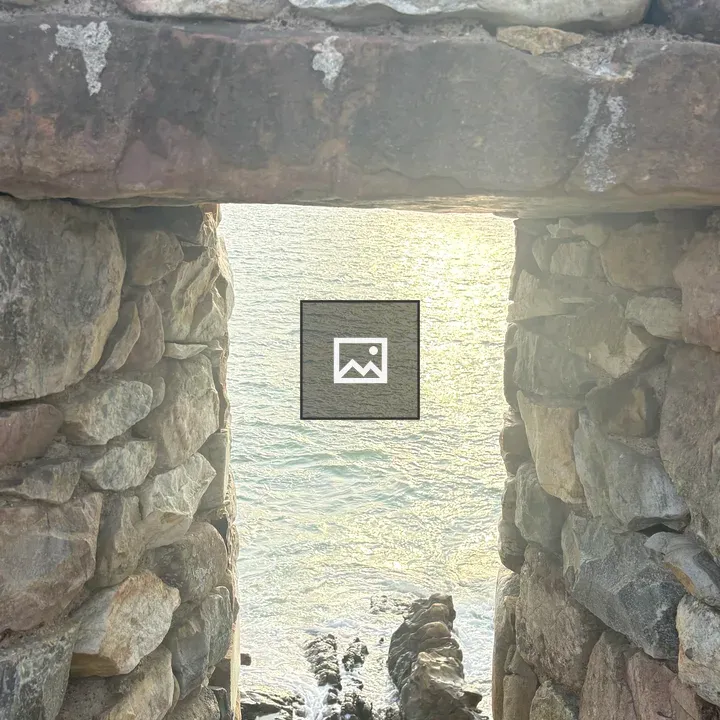 Stone Archway Over Sea