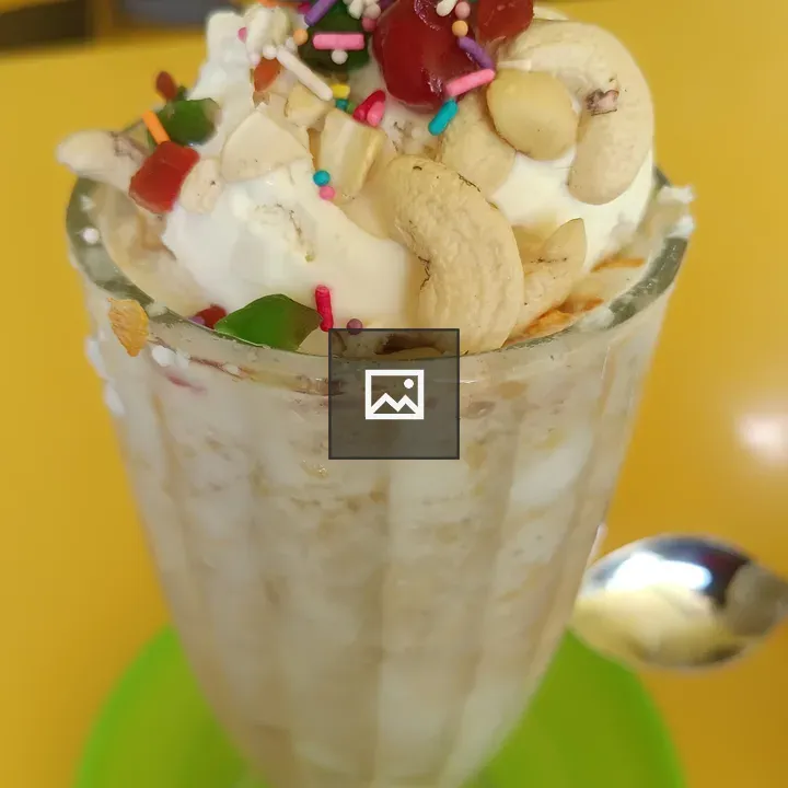 Dessert cup with coconut milk and banana