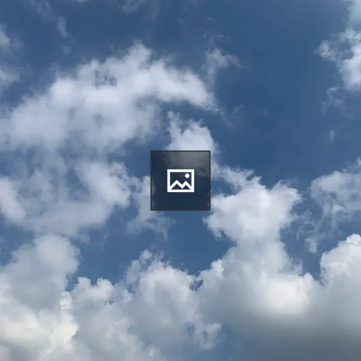 Blue Sky with Fluffy Clouds