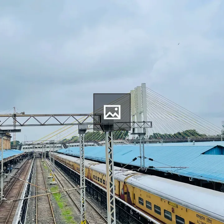 Railway station with train and blue platforms