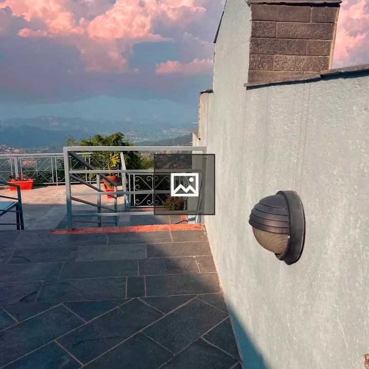 Stone-paved Rooftop Balcony