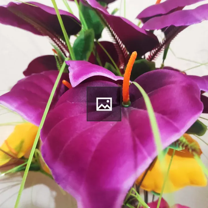 Close-up of purple artificial flowers
