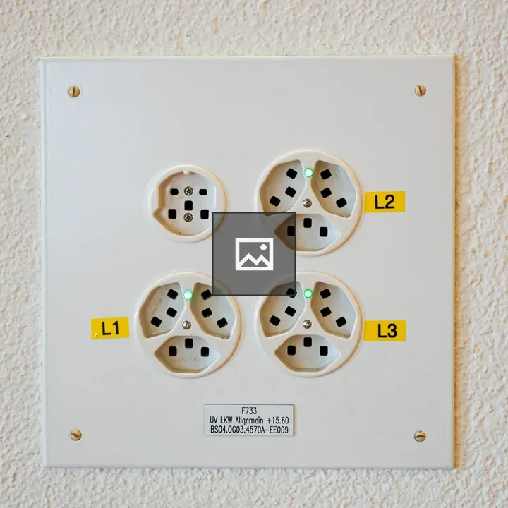 Electrical outlet panel on wall