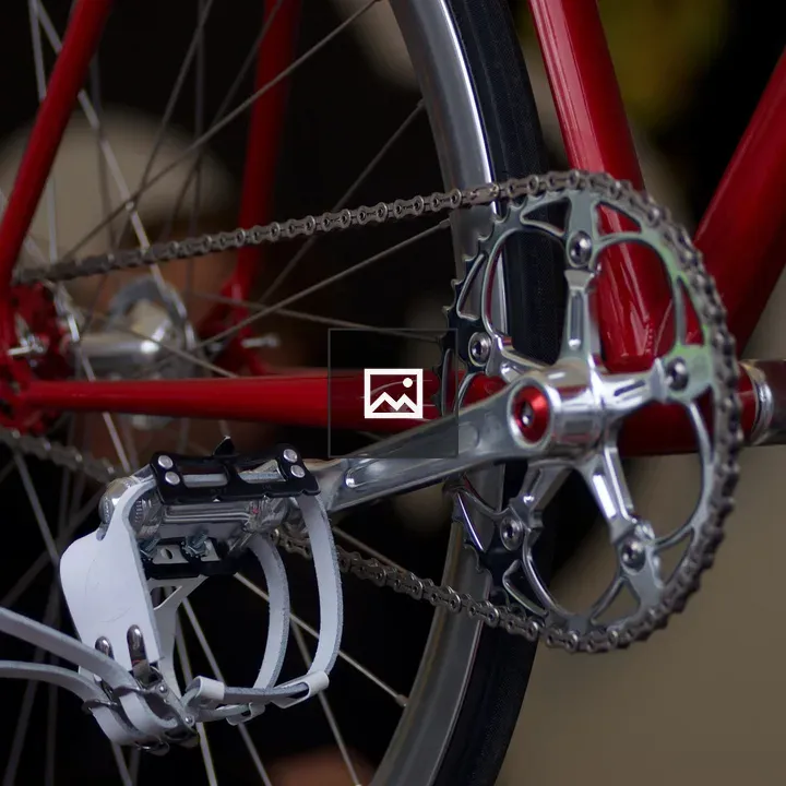 Crankset and Pedals of Red Bicycle