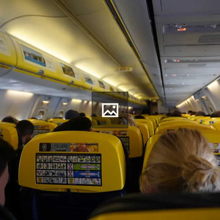 Airplane cabin with yellow seats