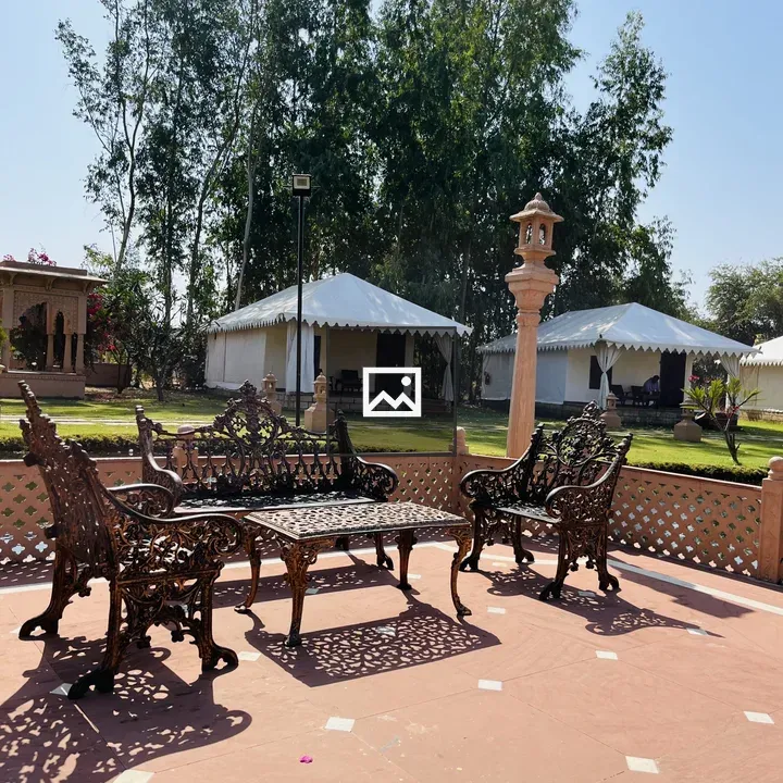 Outdoor seating area with wrought iron furniture