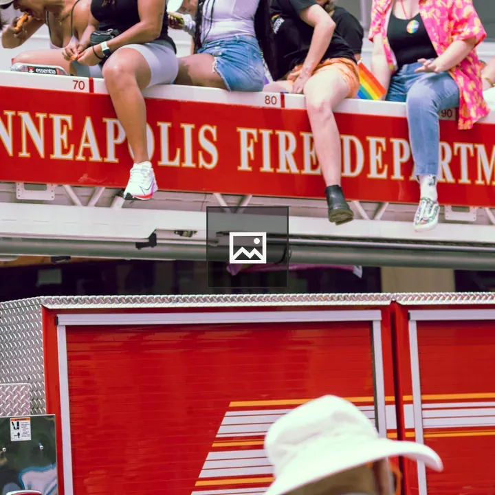 Pride parade on ladder truck