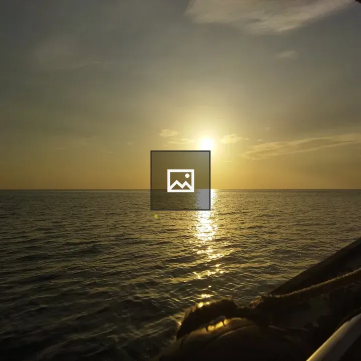 Golden rays on tranquil sea