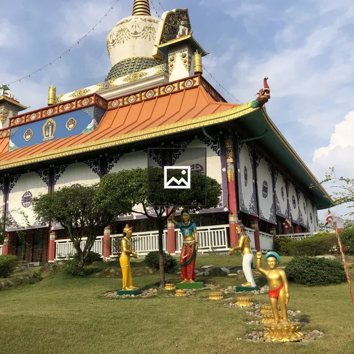 Colorful Buddhist temple with stupa