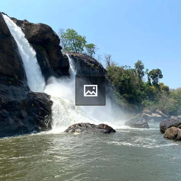Waterfall with forest backdrop