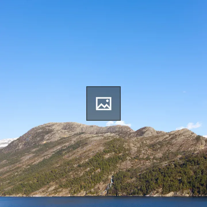 Norwegian fjord under blue sky
