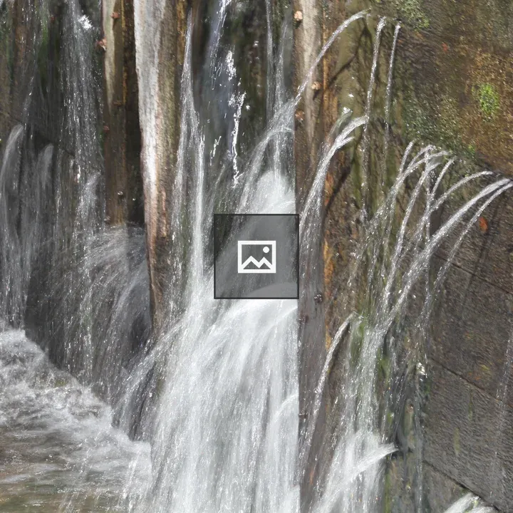 Water cascading over wood