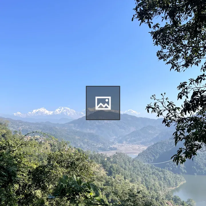 Snow-capped mountains and lake