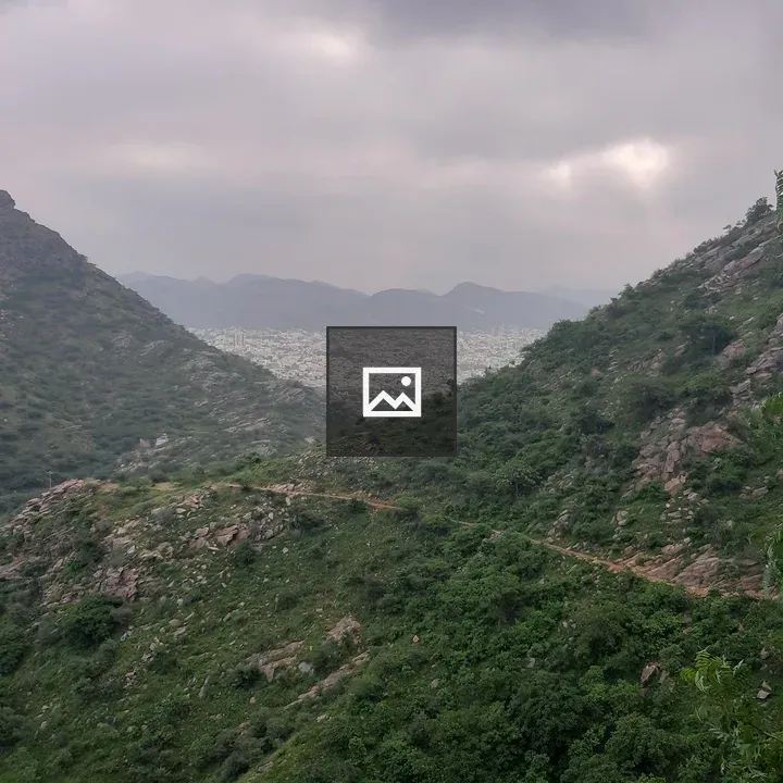 Valley with hills and city far away
