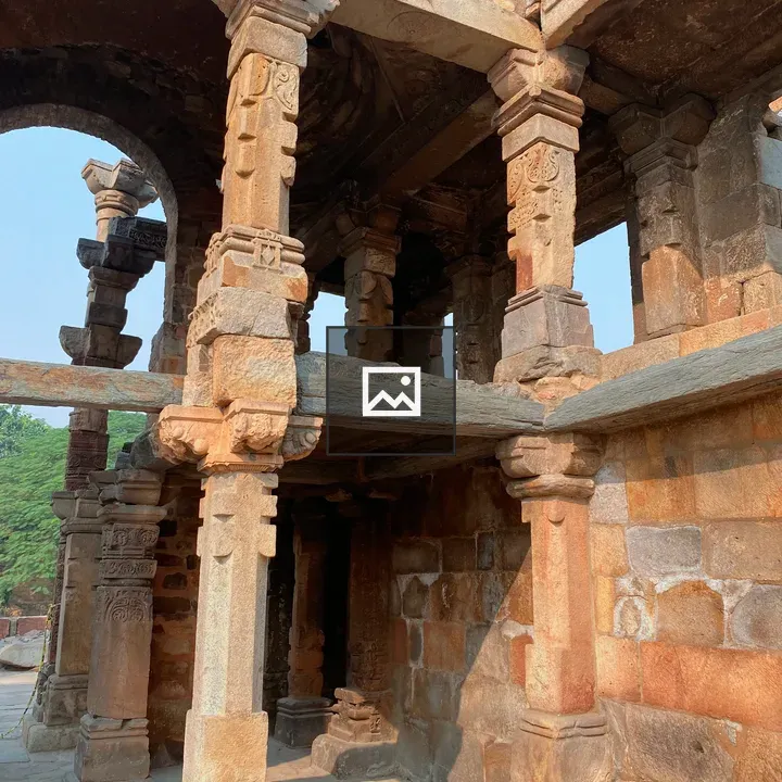 Ancient stone building with carved pillars