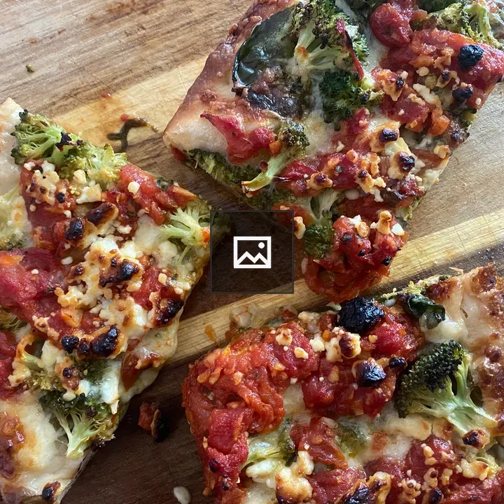 Broccoli, spinach, and Sicilian pizza