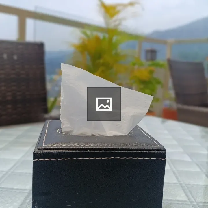 Tissue Box on Glass Table