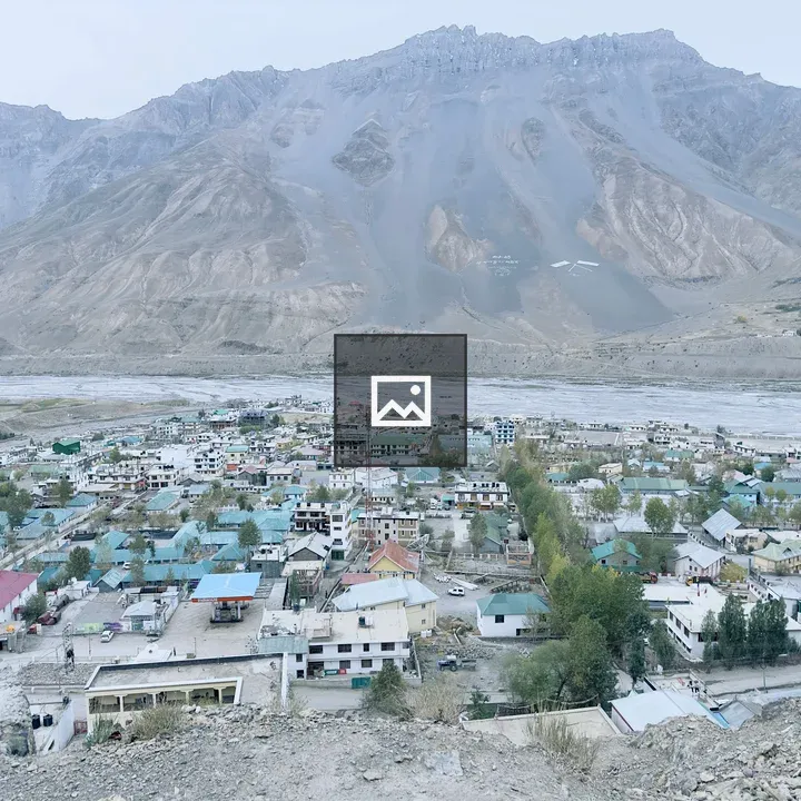 Panoramic Town Between Mountains
