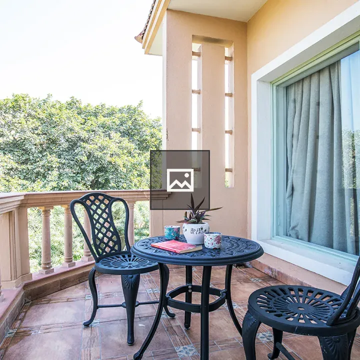 Balcony seating with potted plant
