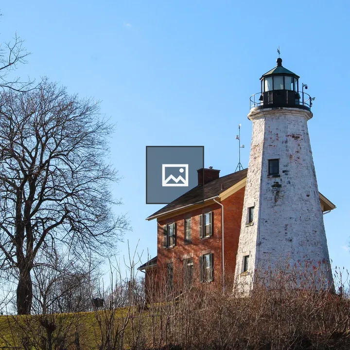 White-washed Lighthouse and House