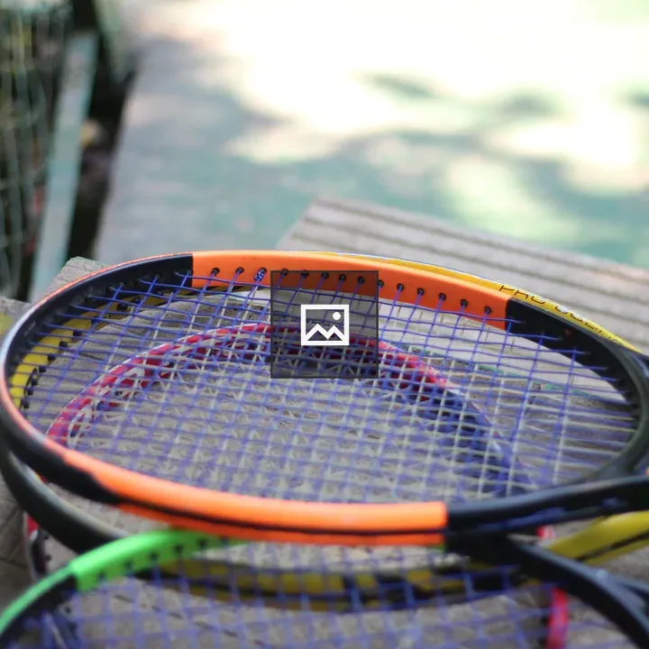 Tennis Rackets Stacked Close-up